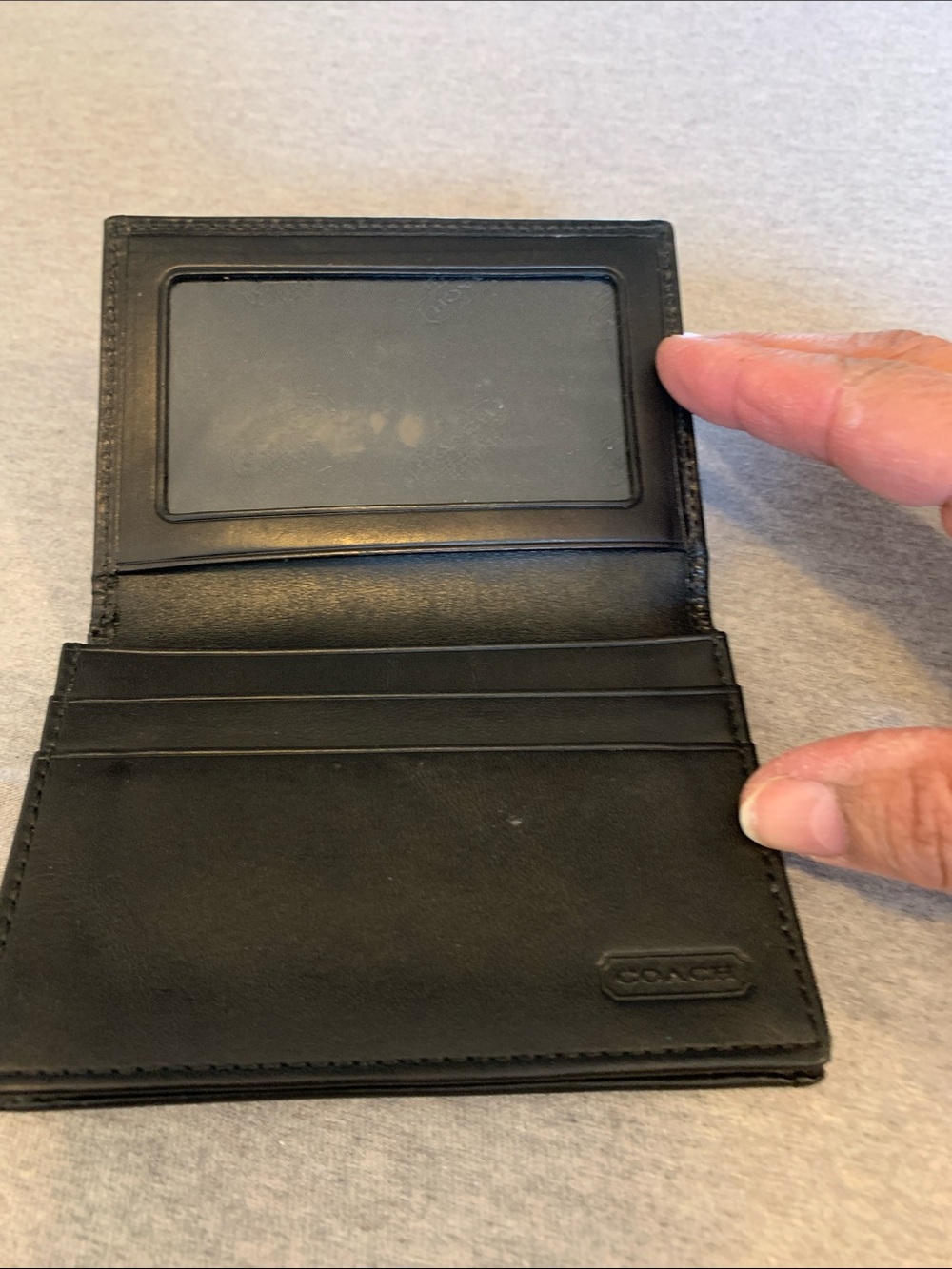 Small Coach card holder.